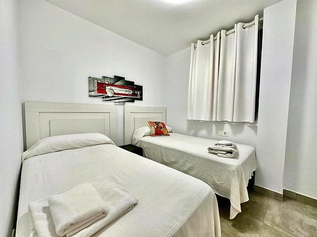 Twin bedroom with two single beds